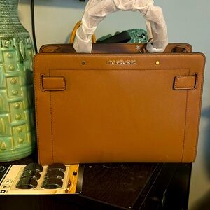 Never used Michael kors going out bag. Never worn, never used once.